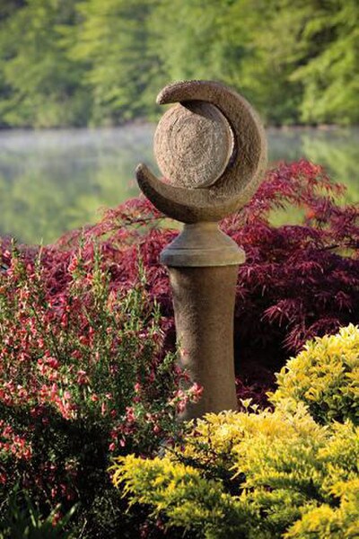 A Garden Of Night and Day On Pedestal Sculpture Cement Garden Art